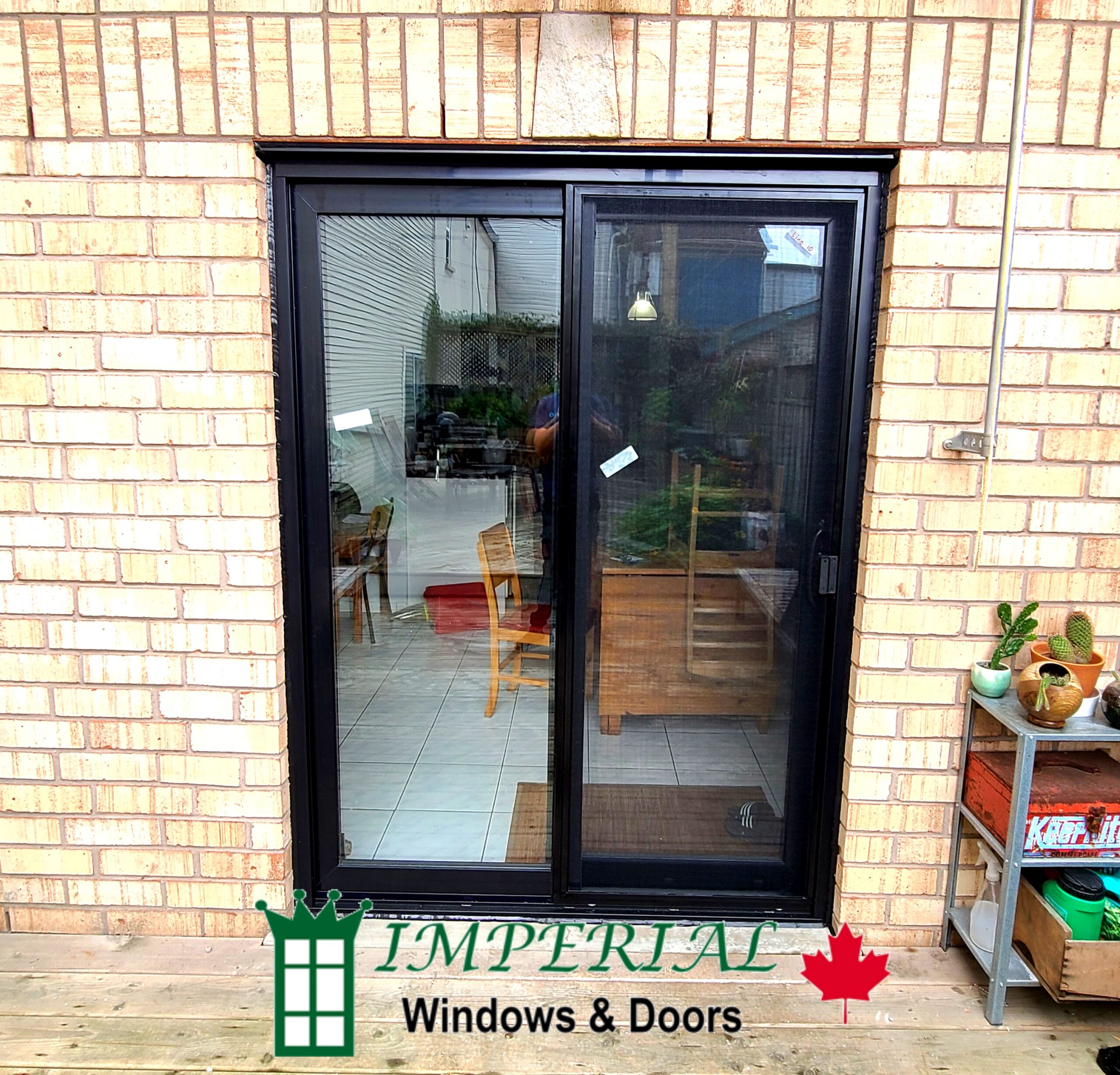 Black frame sliding patio doors exterior view