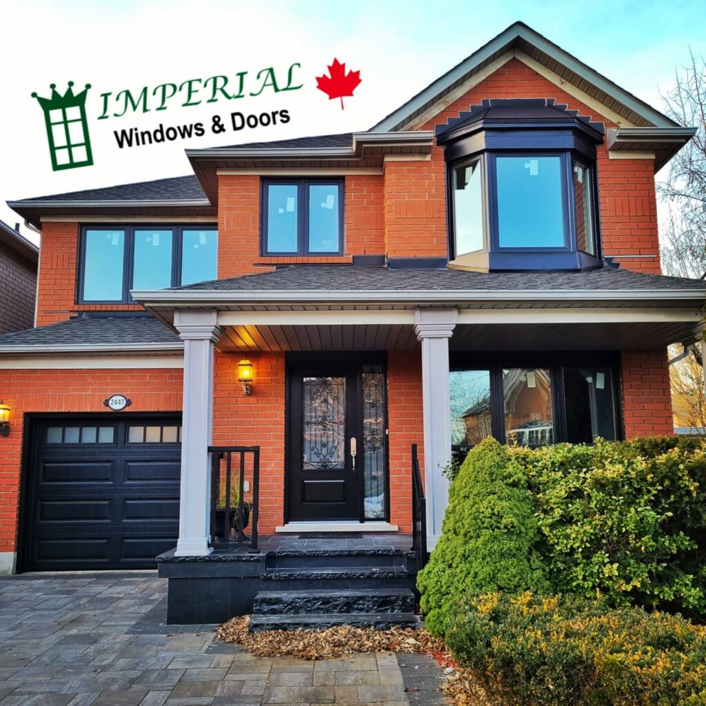 Imperial Windows & Doors replacement windows and entry door installed on a Toronto brick home