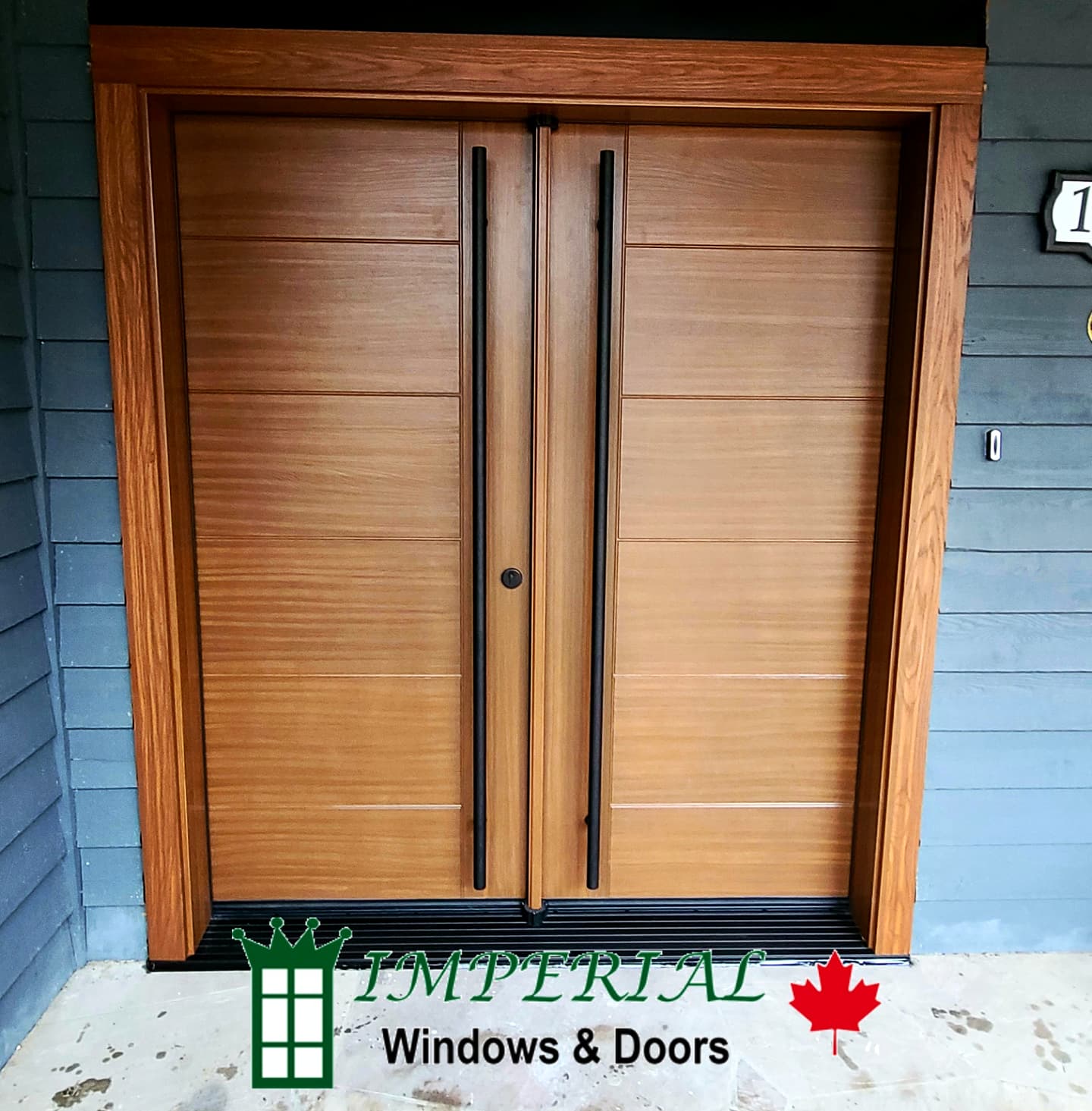 Modern fiberglass entry door with premium security hardware installed in Toronto