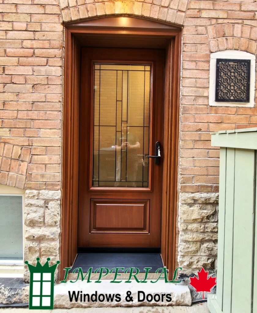Traditional fiberglass entry door with decorative glass in Toronto