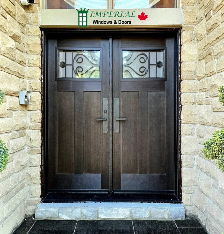 Woodgrain fiberglass double entry doors with decorative glass installed in Toronto
